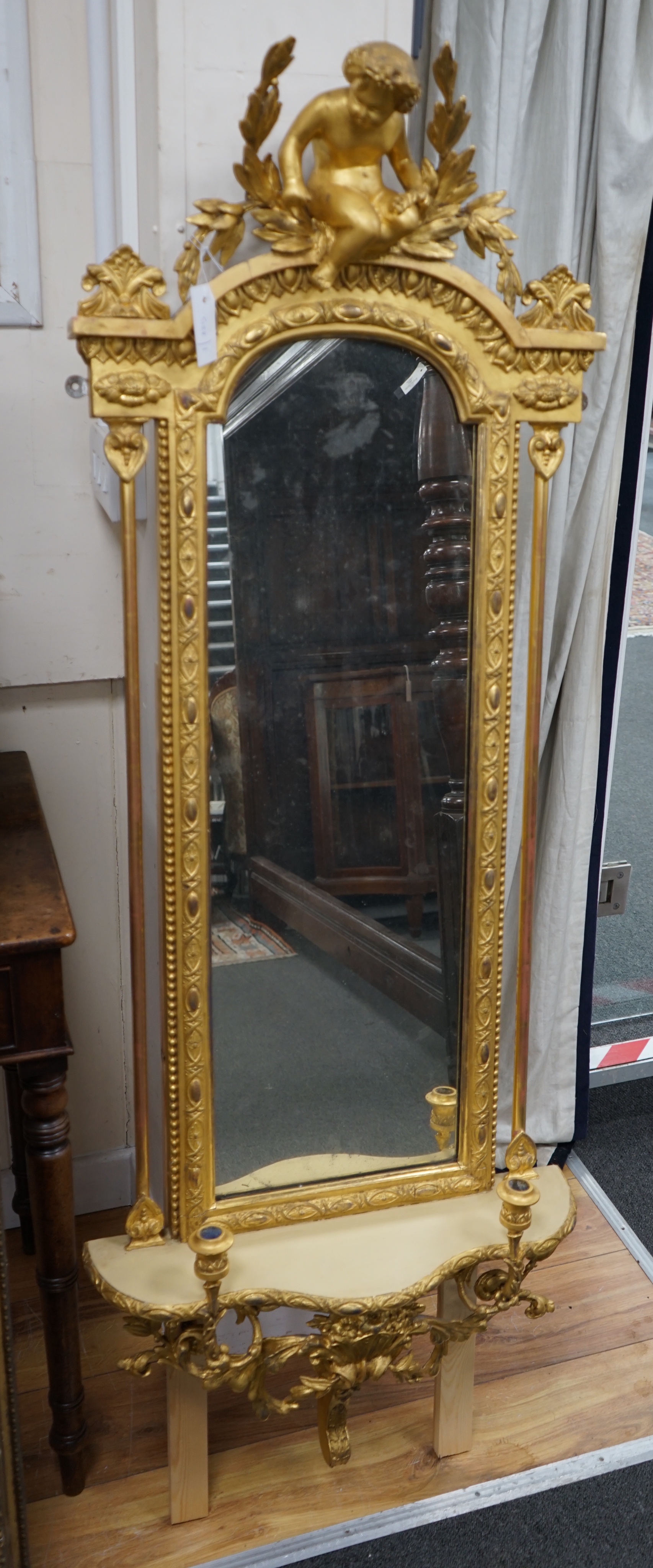 A 19th century giltwood and gesso girandole pier glass, width 54cm height approx. 155cm